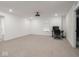 Large bonus room with natural light, carpeted floor, and ceiling fan at 20398 N Pacific Ave, Westfield, IN 46074