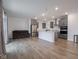 Bright kitchen featuring stainless steel appliances and large island with quartz countertops at 20398 N Pacific Ave, Westfield, IN 46074