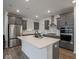 Bright kitchen featuring stainless steel appliances, white countertops, and subway tile backsplash at 20398 N Pacific Ave, Westfield, IN 46074