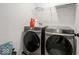 Laundry room with modern washer and dryer at 20398 N Pacific Ave, Westfield, IN 46074