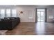 Bright living room with hardwood floors, neutral decor, and sliding glass doors at 20398 N Pacific Ave, Westfield, IN 46074