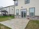 Back patio area, ideal for relaxation and outdoor enjoyment with view of lush lawn at 20398 N Pacific Ave, Westfield, IN 46074