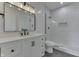 Modern bathroom features a white vanity, sleek fixtures, a large mirror, and a glass-enclosed shower at 2144 Connie Ct, Franklin, IN 46131
