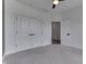 Bedroom with neutral carpet, white trim and walls, and double closet with bi-fold doors at 2144 Connie Ct, Franklin, IN 46131