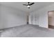 Large bedroom with neutral carpeting, light walls, and easy access to the bathroom at 2144 Connie Ct, Franklin, IN 46131