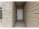 Close-up of the front door featuring decorative glass and stylish hardware at 2144 Connie Ct, Franklin, IN 46131