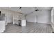 Open kitchen featuring an island with stainless steel dishwasher and light fixture at 2144 Connie Ct, Franklin, IN 46131