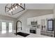 Bright kitchen boasts quartz countertops, stainless steel appliances, white cabinets, and modern light fixture at 2144 Connie Ct, Franklin, IN 46131