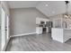 Bright kitchen features white cabinets, stainless steel appliances, and an island with a modern faucet at 2144 Connie Ct, Franklin, IN 46131