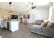 Open-concept living room featuring an island and modern lighting at 2144 Connie Ct, Franklin, IN 46131
