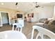 Open-concept living room featuring an island and modern lighting at 2144 Connie Ct, Franklin, IN 46131