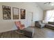 Living room with soft chair and a decorative Gathering picture gallery at 2144 Connie Ct, Franklin, IN 46131