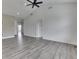 Bright, open living space with neutral walls, laminate floors, and modern lighting at 2144 Connie Ct, Franklin, IN 46131