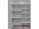 Walk-in pantry with white shelving, ready to be organized for ample storage at 2144 Connie Ct, Franklin, IN 46131
