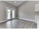 Bright dining area with new laminate floors, with patio door access to the backyard at 2144 Connie Ct, Franklin, IN 46131