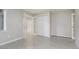 Bright bedroom with tiled floors, double closets and glass paneled doors at 2305 Van Ness Pl, Indianapolis, IN 46240