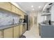 Spacious kitchen with stainless steel appliances, modern cabinets, and a view into the rest of the house at 2305 Van Ness Pl, Indianapolis, IN 46240