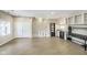 Open floorplan living room with ample cabinets and light flooring at 2305 Van Ness Pl, Indianapolis, IN 46240