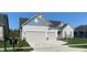 Beautiful home featuring a two-car garage, neutral siding, and well-maintained landscaping at 2755 Ruffian Dr, Westfield, IN 46074