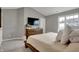 Vaulted ceiling bedroom featuring sleek dresser and TV at 3123 Bolton Square Blvd, Indianapolis, IN 46222