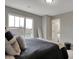 Comfortable bedroom with a bed and a window offering neighborhood views, complemented by neutral tones at 3123 Bolton Square Blvd, Indianapolis, IN 46222