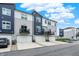 Townhome exterior with modern finishes, individual garages, and well-maintained landscaping enhancing curb appeal at 3123 Bolton Square Blvd, Indianapolis, IN 46222