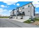 Attractive townhome complex with private garages and balconies, offering a modern and convenient lifestyle at 3123 Bolton Square Blvd, Indianapolis, IN 46222