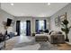 Inviting living space featuring a comfortable seating arrangement and a view to the outside balcony at 3123 Bolton Square Blvd, Indianapolis, IN 46222