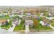 Overhead view of a house with lush landscaping, a two-car garage, and a long driveway at 3130 Shadow Lake Dr, Indianapolis, IN 46217