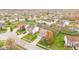 An aerial view highlights this home in a neighborhood with mature trees and landscaping at 3130 Shadow Lake Dr, Indianapolis, IN 46217