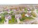 Aerial view of home showing landscaping, lawn, driveway, and neighborhood at 3130 Shadow Lake Dr, Indianapolis, IN 46217