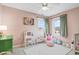 Charming bedroom with natural light, a ceiling fan, and neutral carpet at 3130 Shadow Lake Dr, Indianapolis, IN 46217