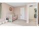 Inviting bedroom with a comfortable bed and doorway to other rooms at 3130 Shadow Lake Dr, Indianapolis, IN 46217