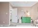 Serene bedroom with neutral walls, carpet, and a green dresser providing a peaceful atmosphere at 3130 Shadow Lake Dr, Indianapolis, IN 46217