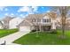 Beautiful two-story home with brick and siding, a two-car garage, and manicured lawn at 3130 Shadow Lake Dr, Indianapolis, IN 46217