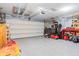 Well-lit garage with epoxy flooring, perfect for storage and hobbies at 3130 Shadow Lake Dr, Indianapolis, IN 46217