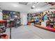 Spacious garage with epoxy floor and plenty of storage space for vehicles and equipment at 3130 Shadow Lake Dr, Indianapolis, IN 46217