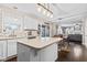 Open kitchen with an island flowing into the dining area and living space at 3130 Shadow Lake Dr, Indianapolis, IN 46217