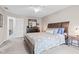 Comfortable main bedroom with neutral walls, soft carpet, and decorative furnishings at 3130 Shadow Lake Dr, Indianapolis, IN 46217