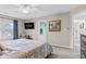 Cozy main bedroom featuring plush carpeting, natural light, and ensuite bathroom access at 3130 Shadow Lake Dr, Indianapolis, IN 46217