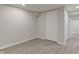 Bright finished basement with new flooring and ample space for storage or a recreation area at 334 N 15Th Ave, Beech Grove, IN 46107