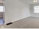 Spacious bedroom with plush carpet and ample natural light at 334 N 15Th Ave, Beech Grove, IN 46107