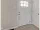 Bright entryway featuring a white door and neutral decor at 334 N 15Th Ave, Beech Grove, IN 46107