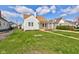 Quaint home featuring a well-maintained lawn and classic architectural details at 334 N 15Th Ave, Beech Grove, IN 46107