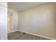 Neutral hallway with LVP flooring leads to other areas of the home at 334 N 15Th Ave, Beech Grove, IN 46107
