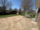 Spacious backyard with a patio and swing, great for outdoor relaxation and entertainment at 3413 Ivory Way, Indianapolis, IN 46227