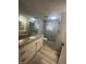 Bathroom featuring a modern vanity, toilet, and good lighting at 3413 Ivory Way, Indianapolis, IN 46227