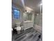 Bathroom featuring dual sinks, window, shower and toilet at 3413 Ivory Way, Indianapolis, IN 46227