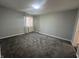 A spacious bedroom with neutral walls and carpet flooring at 3413 Ivory Way, Indianapolis, IN 46227