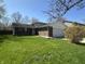 Charming brick home with a well-manicured lawn and attached two-car garage at 3413 Ivory Way, Indianapolis, IN 46227